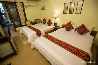 Deluxe con due letti queen — Khách sạn Minh Châu - Hòa Hưng